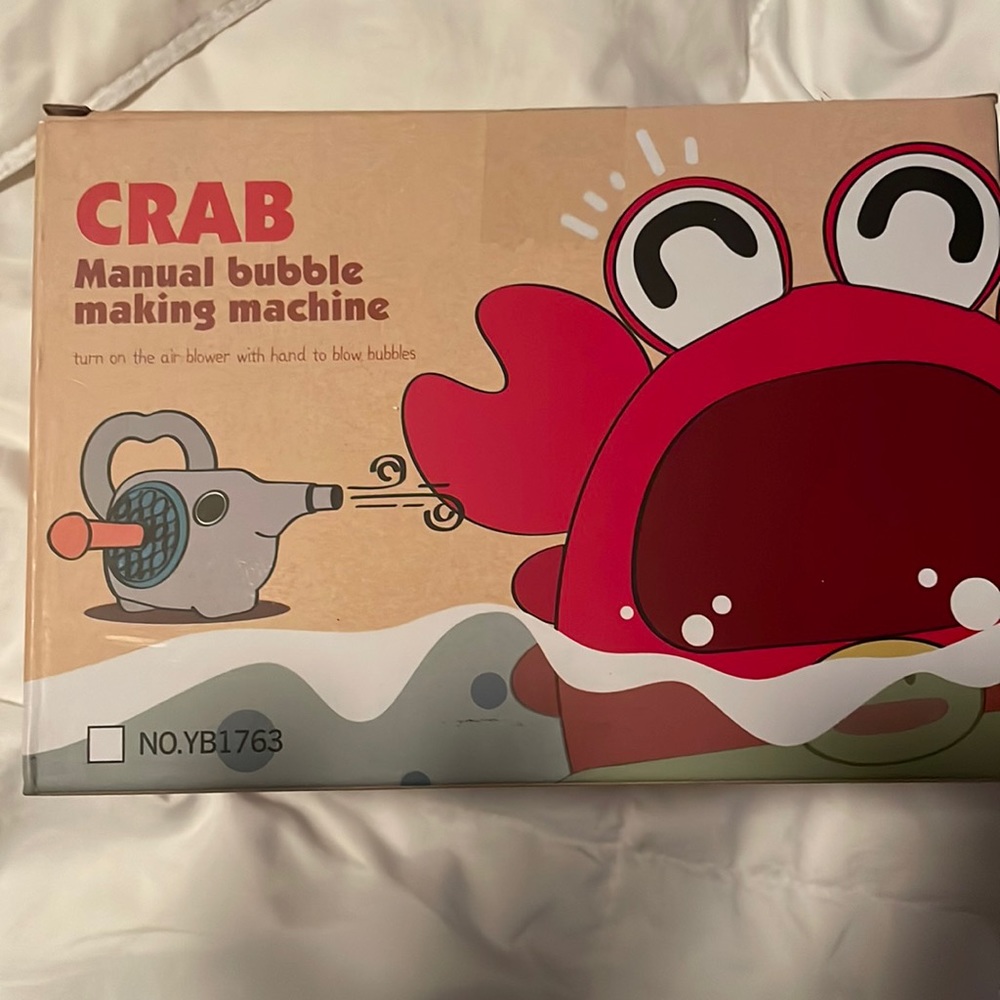 Kids bubble making machine. New in box. Never opened.